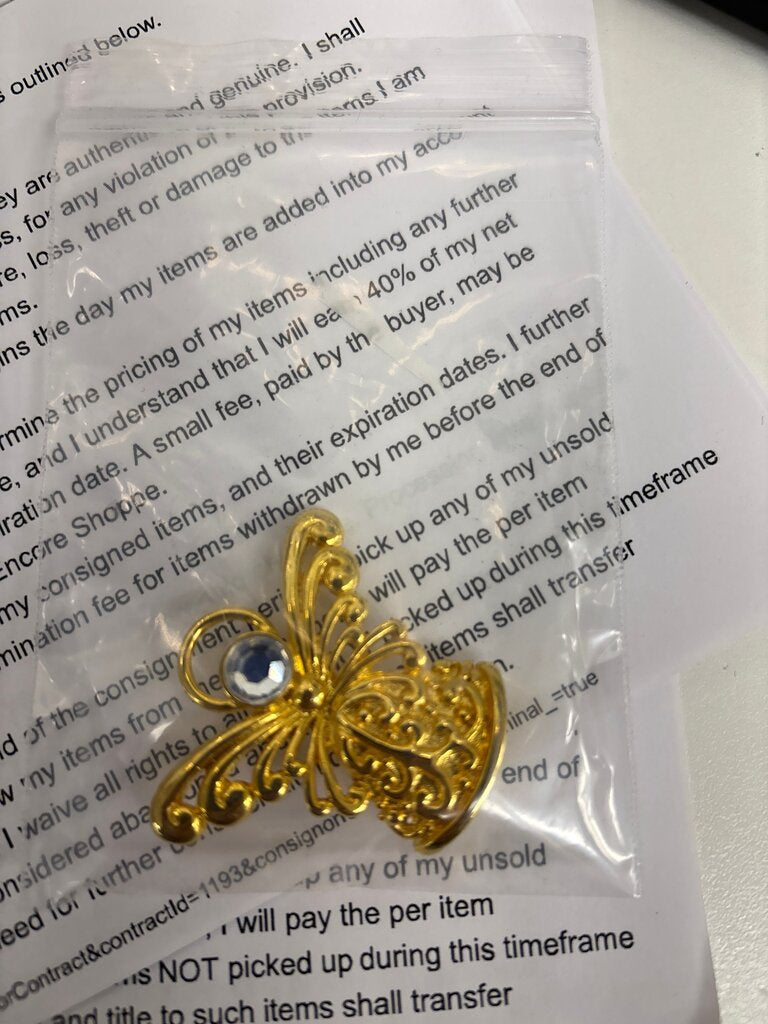 Gold Butterfly Brooch with Blue Gem